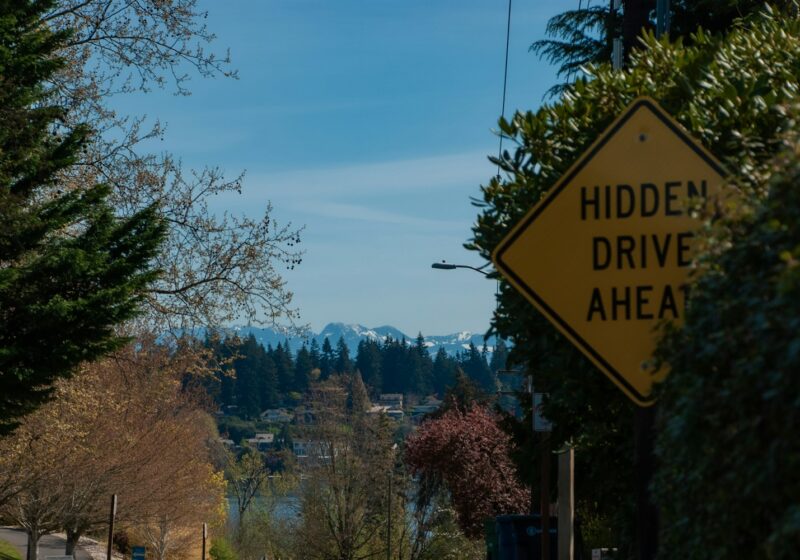 A street sign on the side of a road