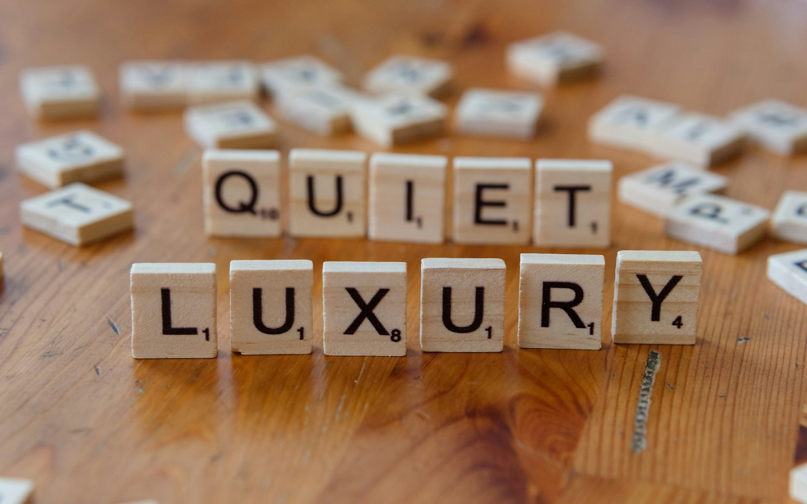 Scrabble tiles spelling the word quiet, quiet, quiet, quiet, quiet