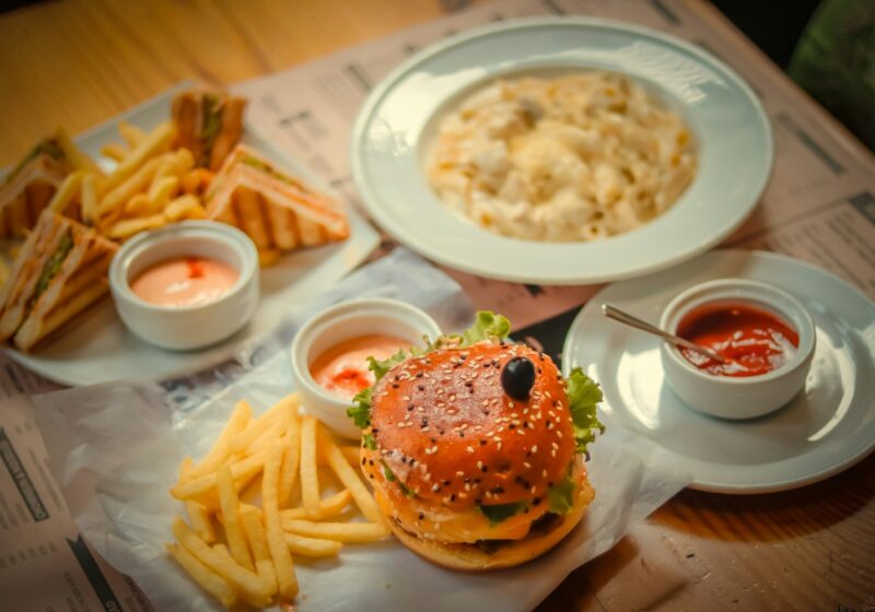 burger with fries on white ceramic plate