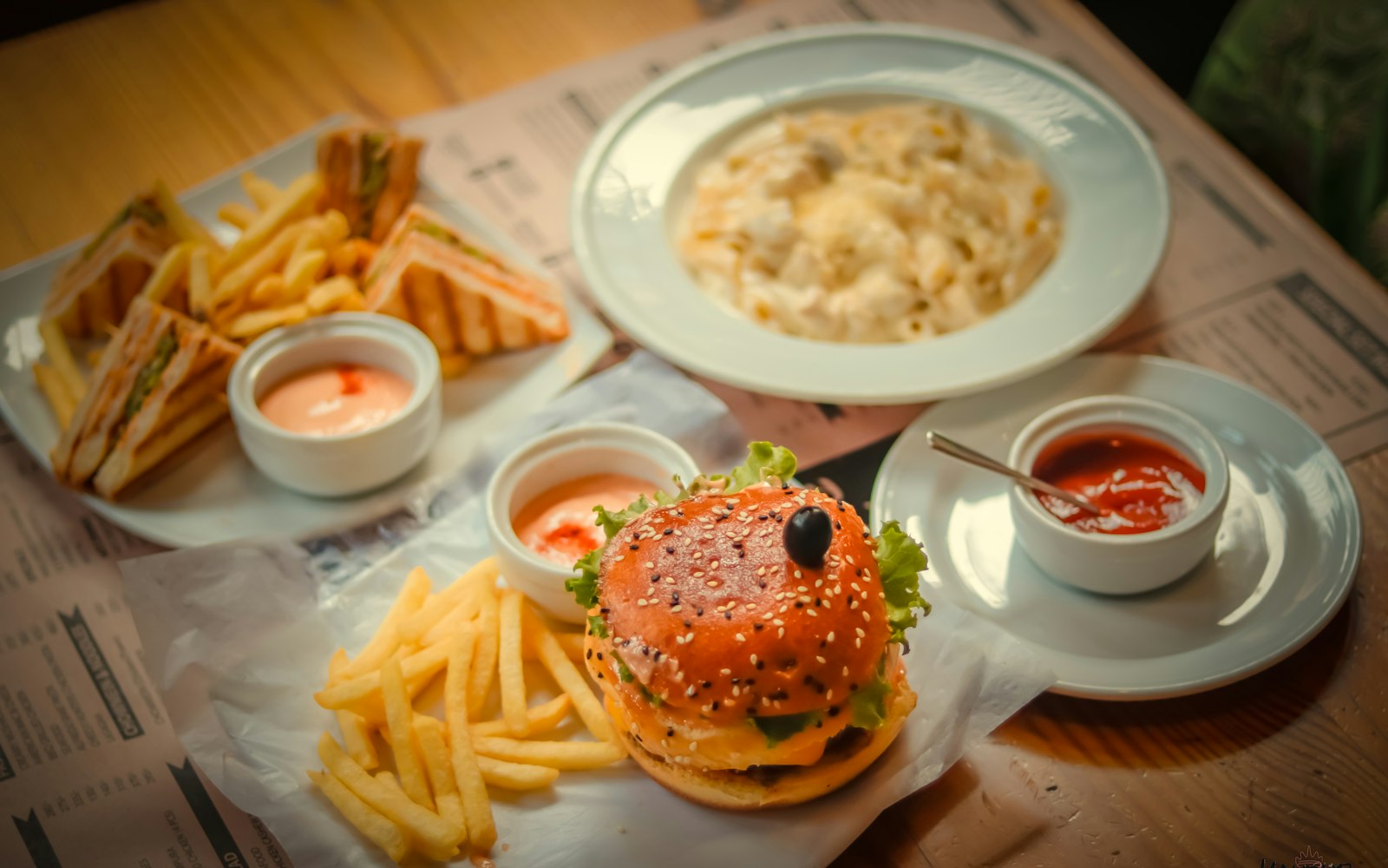 burger with fries on white ceramic plate